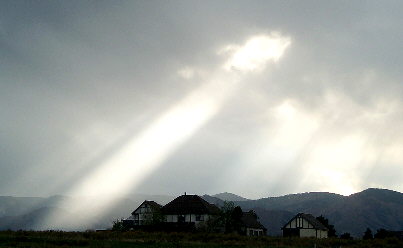 the sun breaks through the clouds